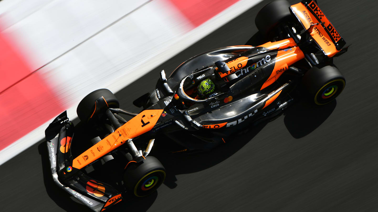 ABU DHABI, UNITED ARAB EMIRATES - DECEMBER 10: Lando Norris of Great Britain driving the (4)