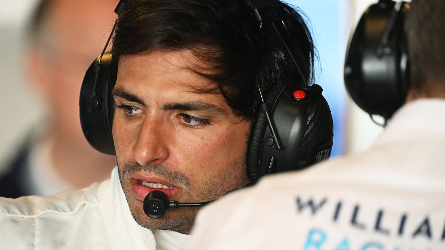 ABU DHABI, UNITED ARAB EMIRATES - DECEMBER 10: Carlos Sainz of Spain and Williams talks with his