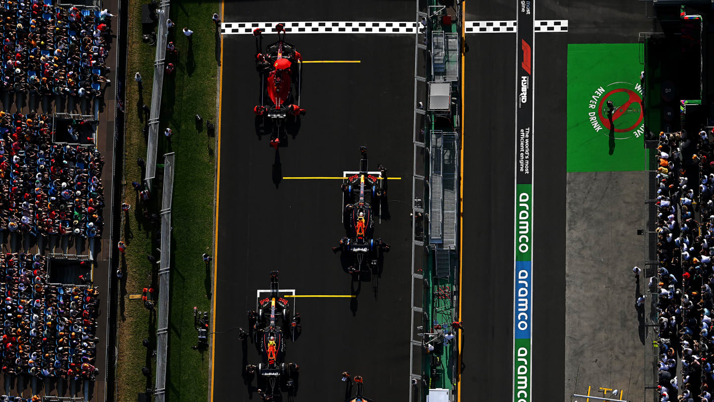 MELBOURNE, AUSTRALIA - APRIL 10: Charles Leclerc of Monaco and Ferrari, Max Verstappen of the