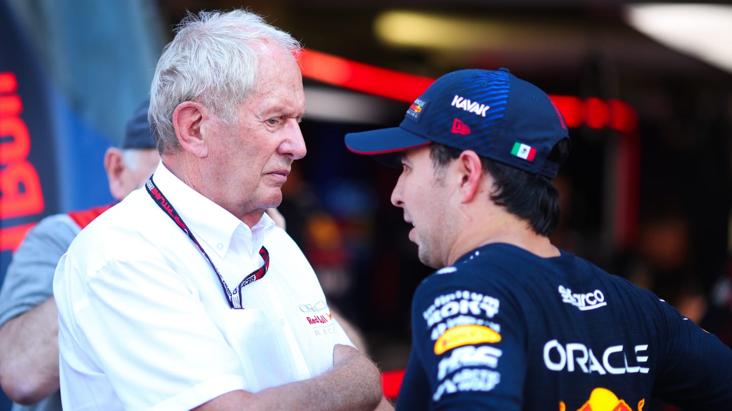 MONTE-CARLO, MONACO - MAY 26: Helmut Marko of Red Bull Racing speaks with Sergio Perez of Mexico