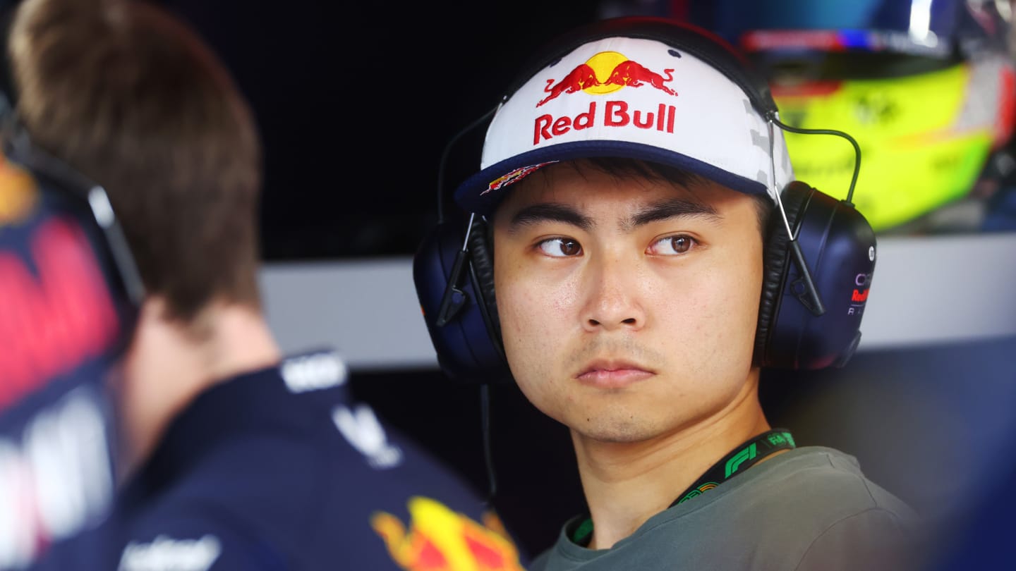 SUZUKA, JAPAN - SEPTEMBER 22: Ayumu Iwasa of Japan looks on in the Red Bull Racing garage during