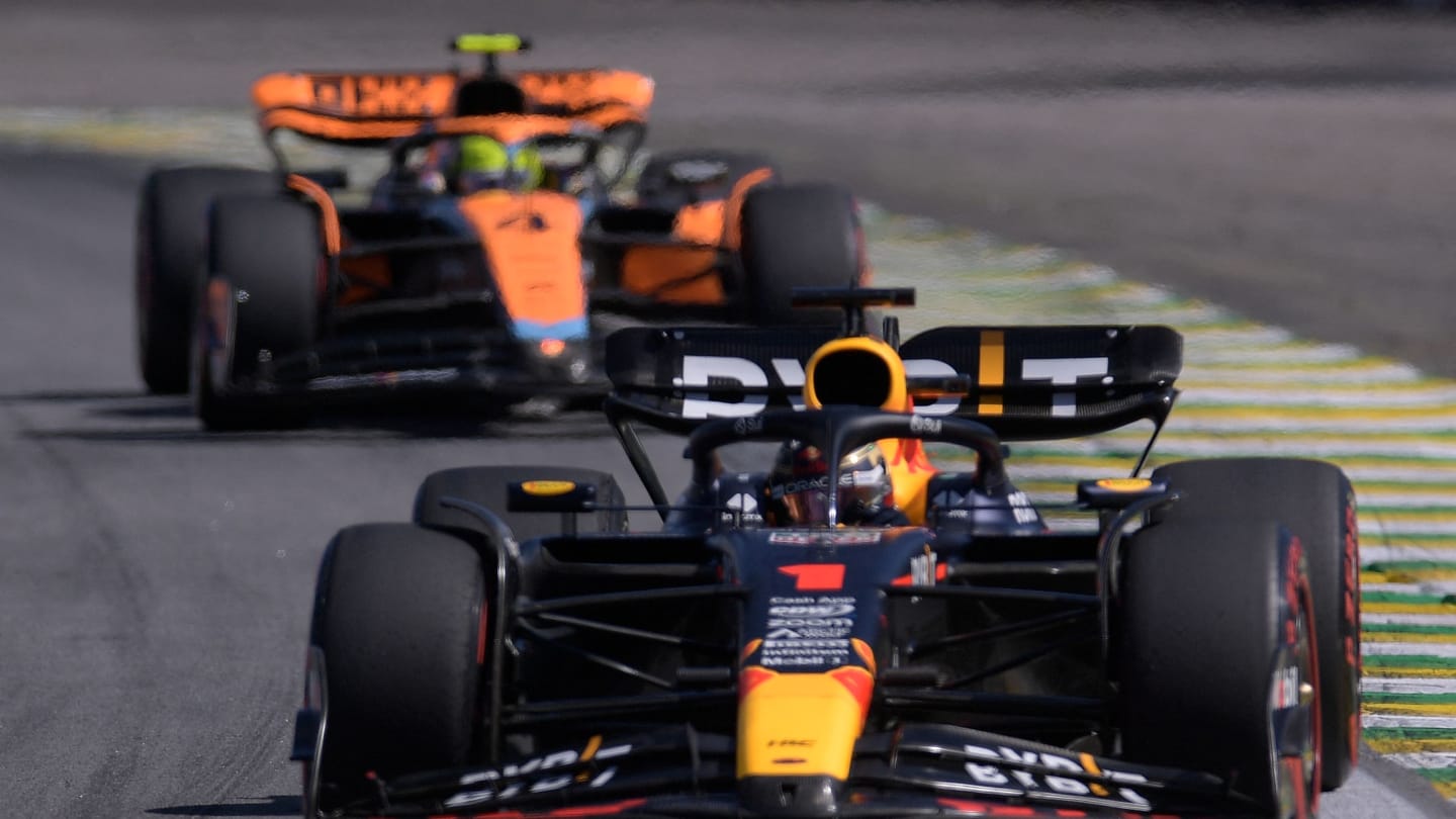 Red Bull Racing's Dutch driver Max Verstappen leads ahead of McLaren's British driver Lando Norris