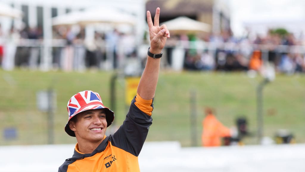 NORTHAMPTON, ENGLAND - JULY 03: Lando Norris of McLaren and Great Britain waves to the crowd during