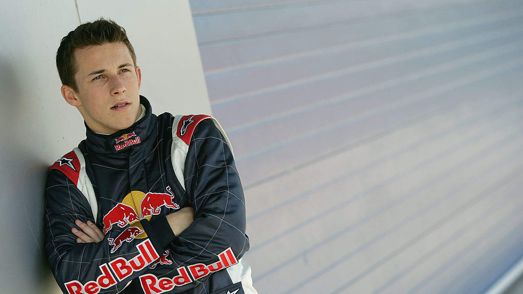 JEREZ, SPAIN - FEBRUARY 8:  Christian Klien of Austria and Red Bull poses in the team garage during