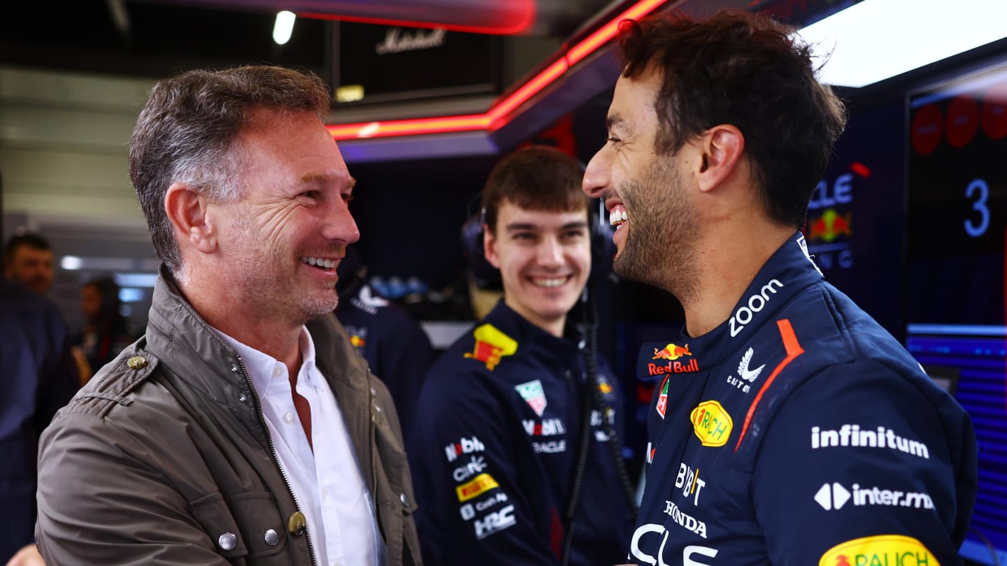 NORTHAMPTON, ENGLAND - JULY 11:  Daniel Ricciardo of Australia and Oracle Red Bull Racing speaks with Red Bull Racing Team Principal Christian Horner as he prepares to drive during Formula 1 testing at Silverstone Circuit on July 11, 2023 in Northampton, England. (Photo by Mark Thompson/Getty Images) // Getty Images / Red Bull Content Pool // SI202307110143 // Usage for editorial use only //
