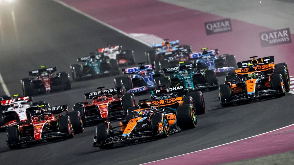 Drivers compete at the start of the sprint race ahead of the Qatari Formula One Grand Prix at the