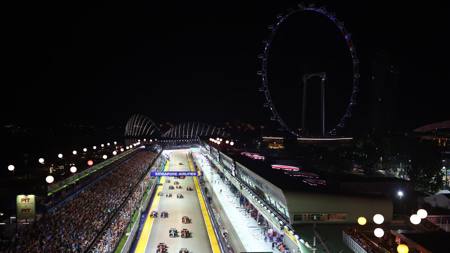 SINGAPORE, SINGAPORE - OCTOBER 02: Sergio Perez of Mexico driving the (11) Oracle Red Bull Racing