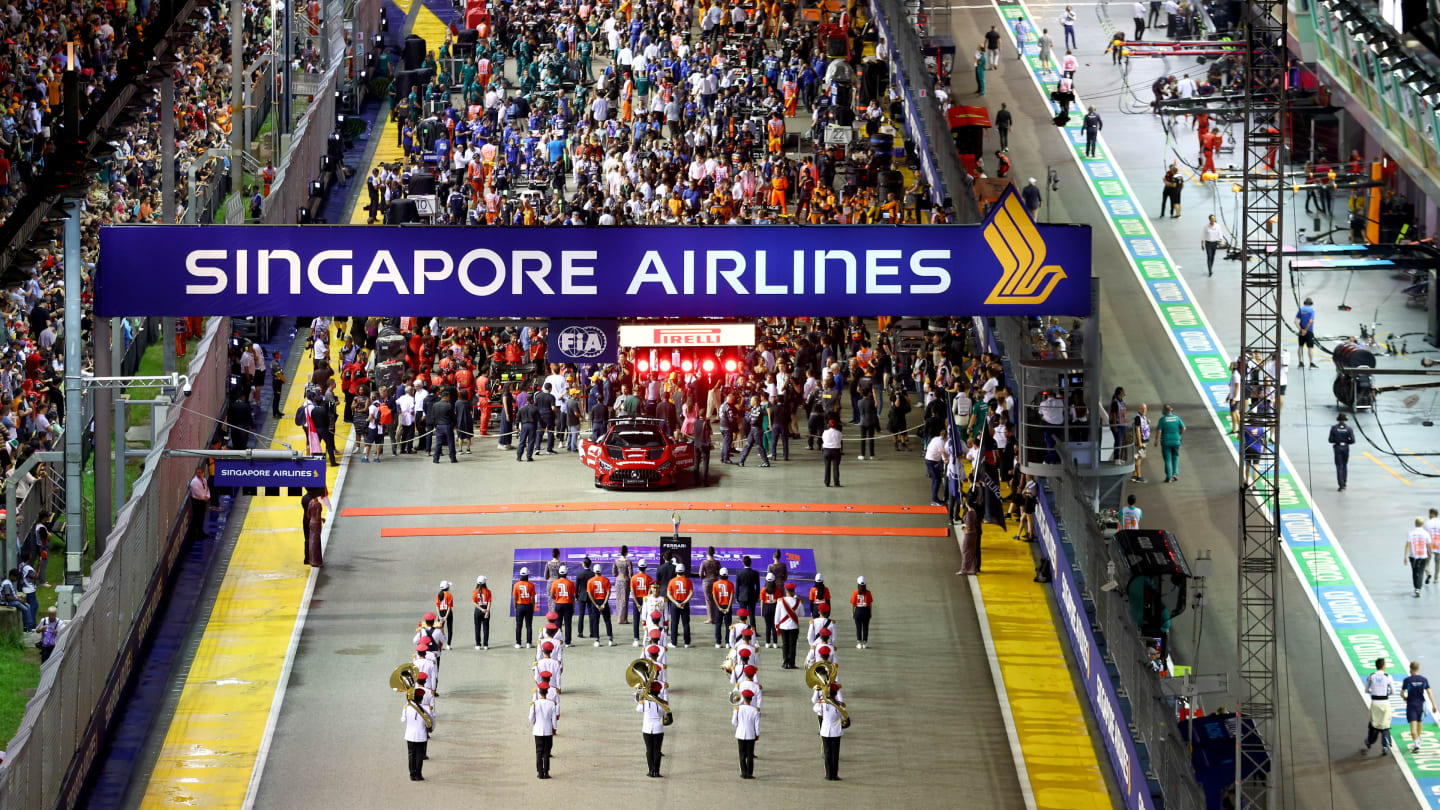SINGAPORE, SINGAPORE - OCTOBER 02: A general view of the grid preparations during the F1 Grand Prix