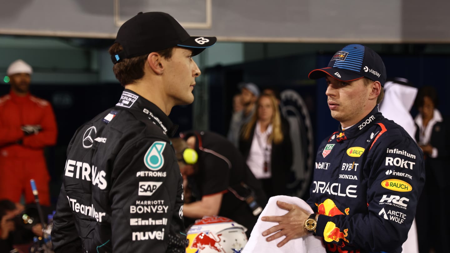 George Russell of Mercedes and Max Verstappen of Red Bull Racing after qualifying ahead of the