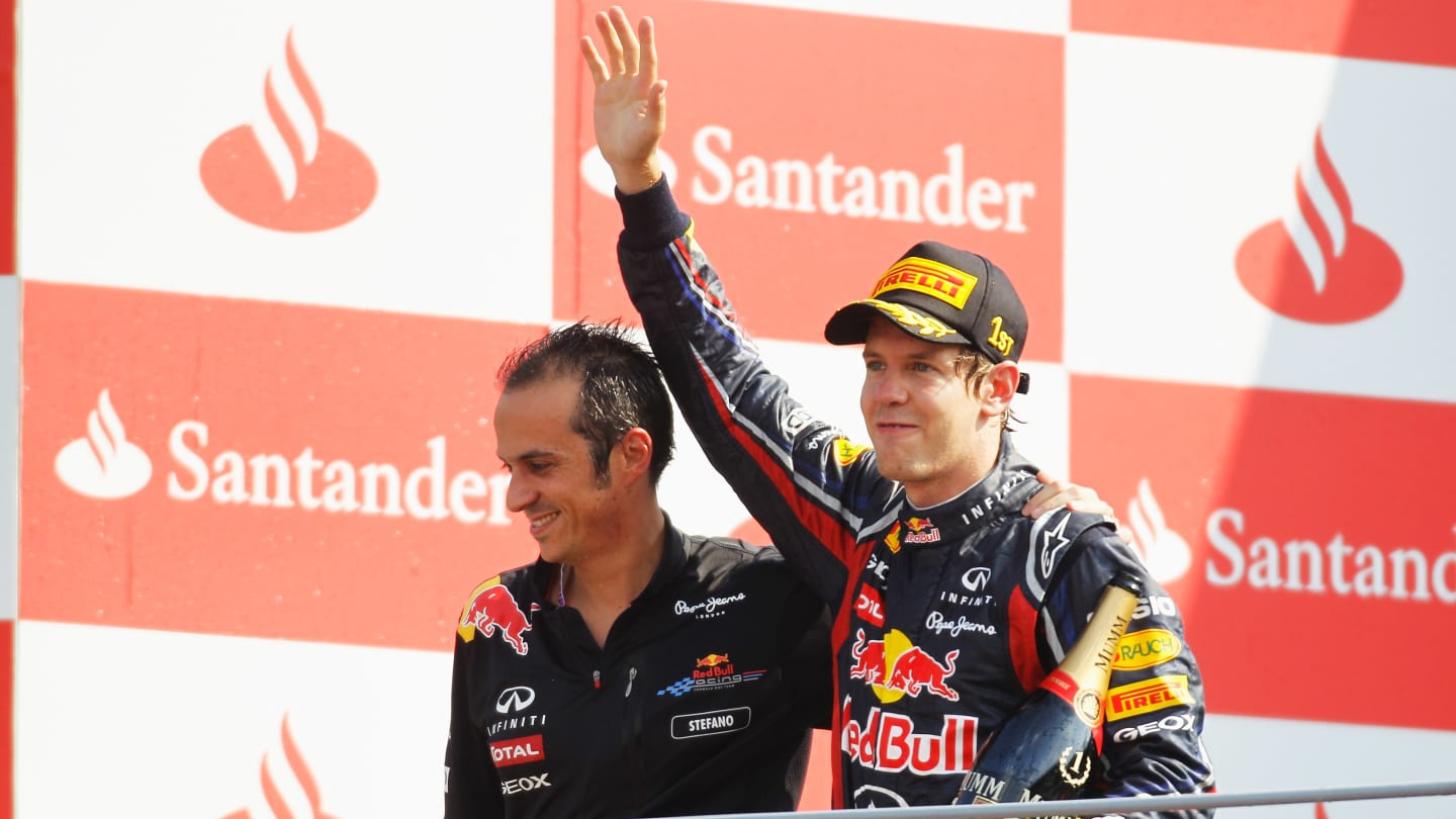 MONZA, ITALY - SEPTEMBER 11:  Sebastian Vettel (R) of Germany and Red Bull Racing celebrates on the