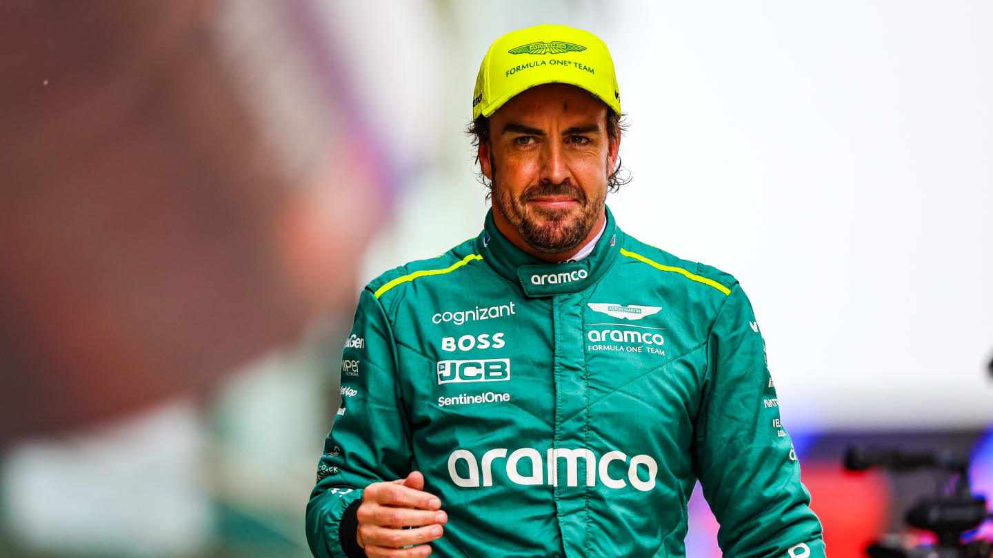 SHANGHAI, CHINA - APRIL 20: Fernando Alonso of Spain and Aston Martin F1 Team walks in parc ferme