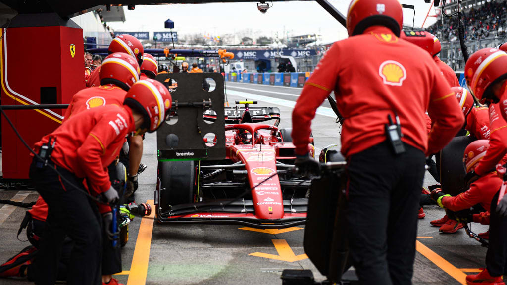 Ferrari's Spanish driver Carlos Sainz Jr. returns to the pit during the second practice session