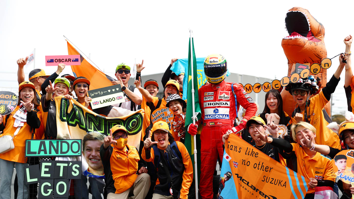 SUZUKA, JAPAN - APRIL 07: McLaren fans pose for a photo prior to the F1 Grand Prix of Japan at