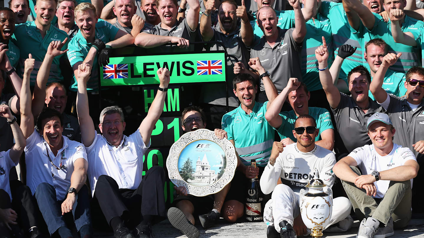 BUDAPEST, HUNGARY - JULY 28:  Lewis Hamilton (2nd right) of Great Britain and Mercedes GP