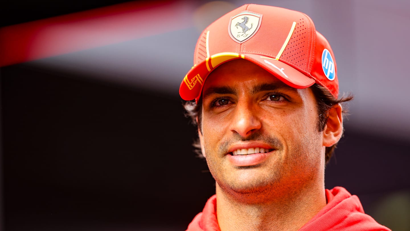 ZANDVOORT, NETHERLANDS - AUGUST 22: Carlos Sainz of Spain and Ferrari looks on in the paddock