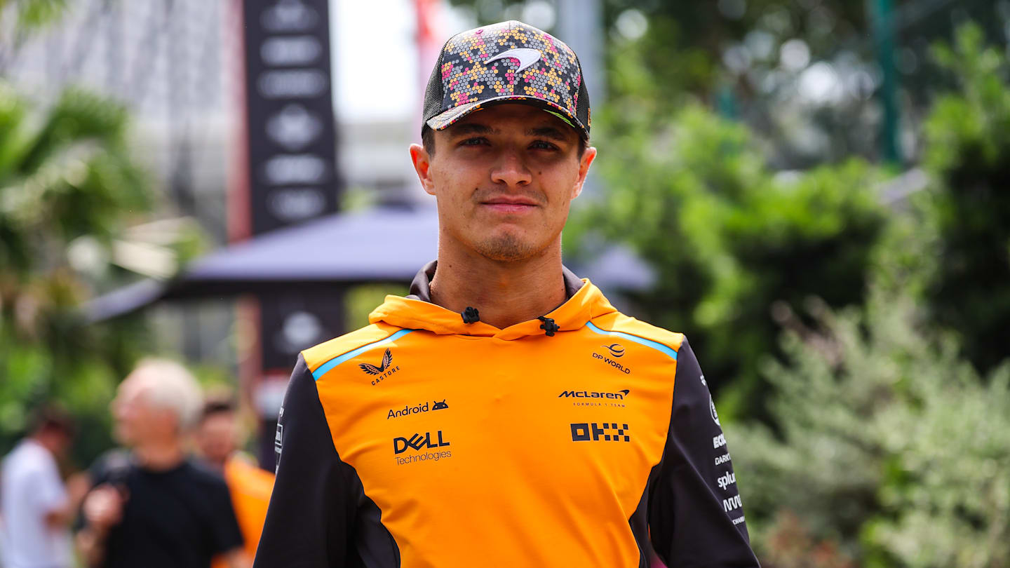 SINGAPORE, SINGAPORE - SEPTEMBER 20: Lando Norris of Great Britain and McLaren walks in the paddock