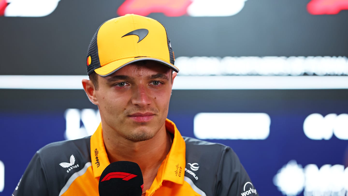 BAHRAIN, BAHRAIN - APRIL 10: Lando Norris of Great Britain and McLaren talks to the media during