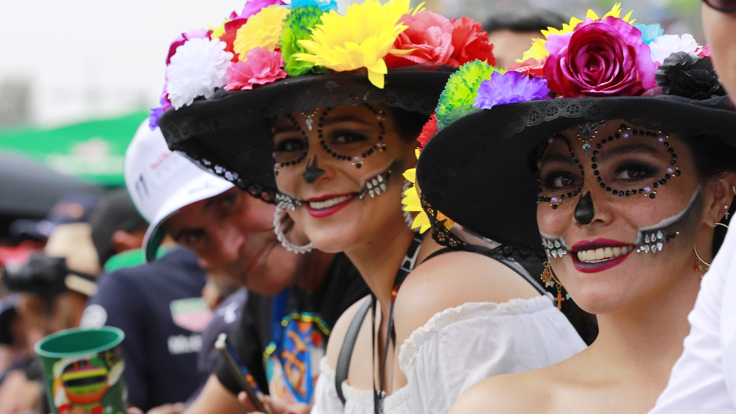 MEXICO CITY, MEXICO - OCTOBER 30: Fans smile prior to the F1 Grand Prix of Mexico at Autodromo