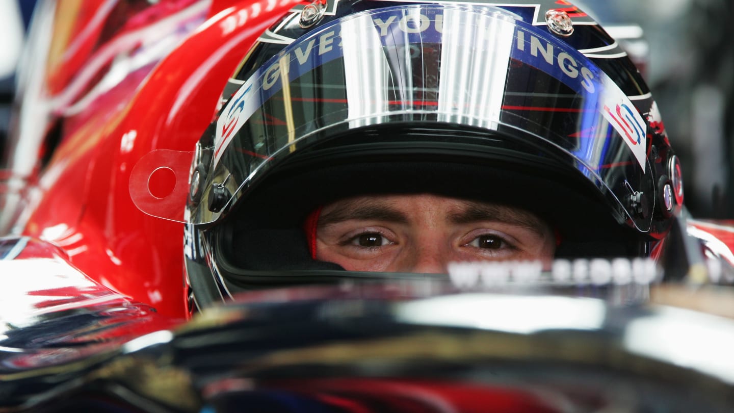 MELBOURNE, AUSTRALIA - MARCH 16:  Scott Speed of the USA and Toro Rosso sits in his car during