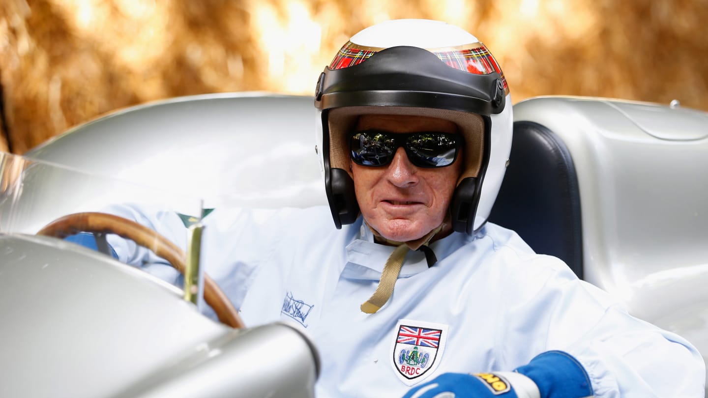CHICHESTER, ENGLAND - JUNE 27:  Sir Jackie Stewart prepares to drive up the hill at Goodwood on