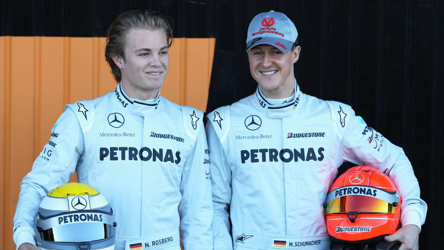 VALENCIA, SPAIN - FEBRUARY 01:  Michael Schumacher (R) of Germany and Mercedes GP and Nico Rosberg