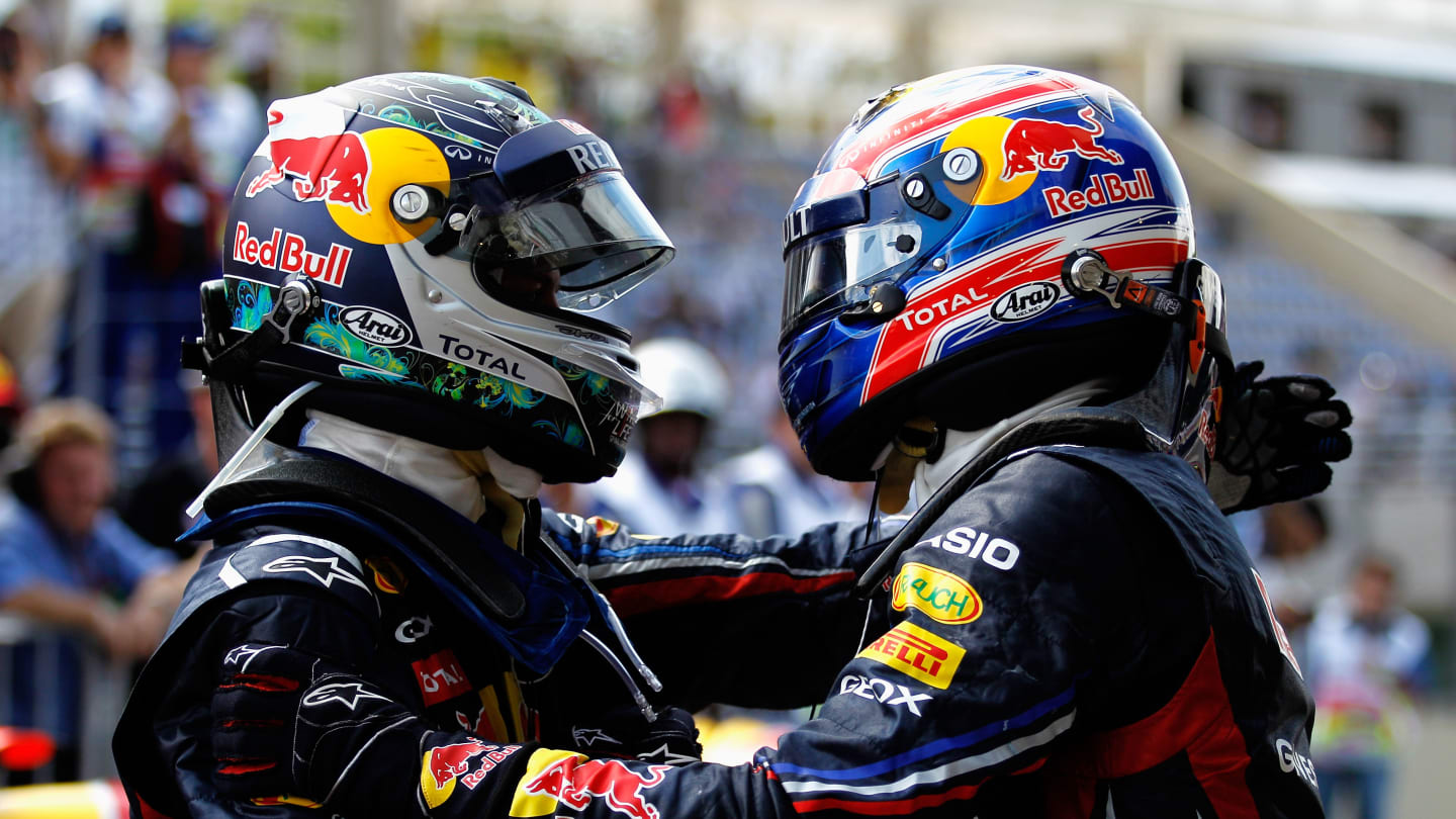 SAO PAULO, BRAZIL - NOVEMBER 27:  Race winner Mark Webber (R) of Australia and Red Bull Racing