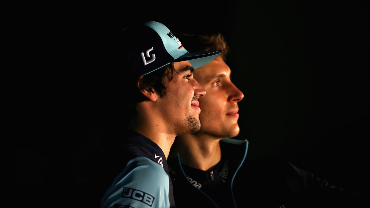 SUZUKA, JAPAN - OCTOBER 06: Lance Stroll of Canada and Williams and Sergey Sirotkin of Russia and