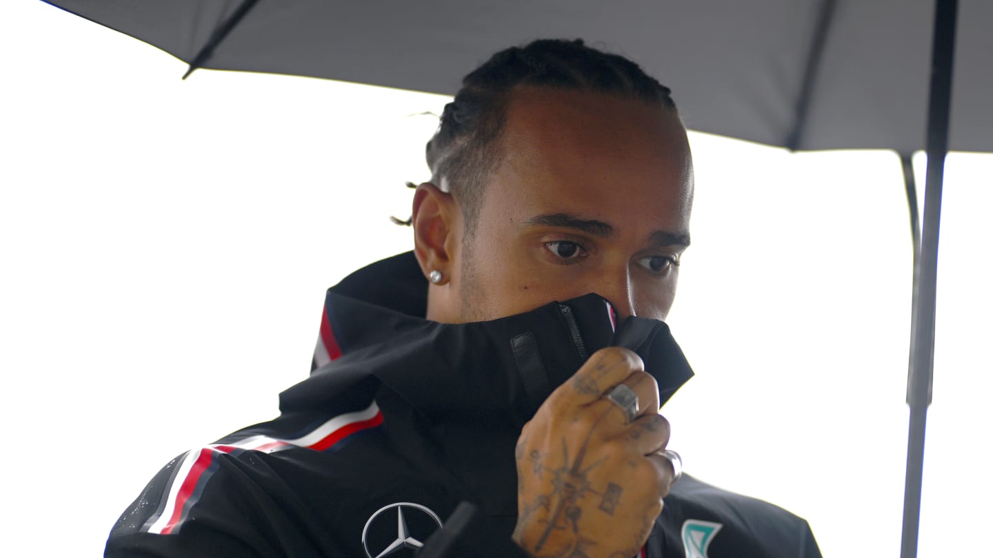 MONTREAL, QUEBEC - JUNE 15:  Lewis Hamilton of Great Britain and Mercedes walks in the Paddock