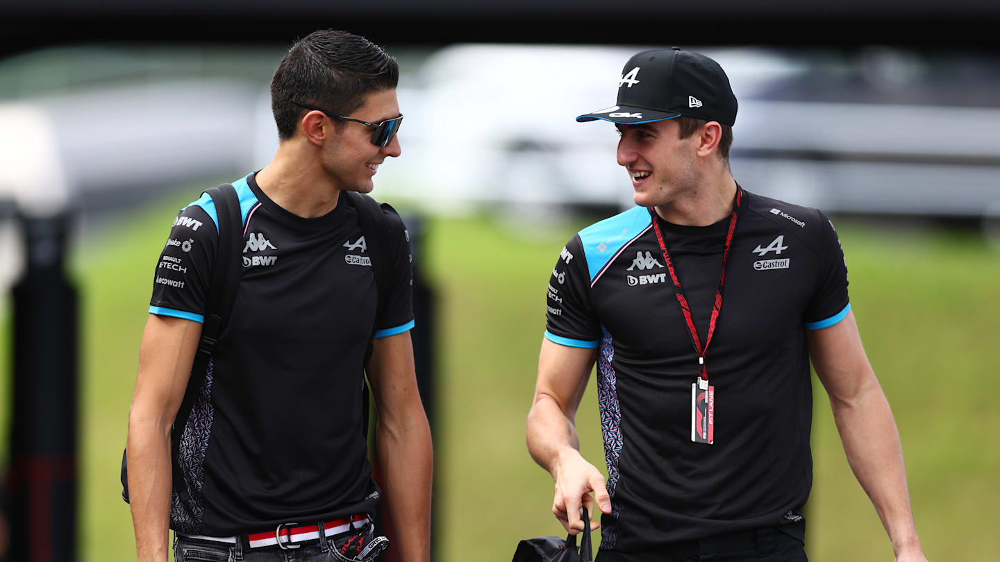 SUZUKA, JAPAN - SEPTEMBER 22: Esteban Ocon of France and Alpine F1 and Jack Doohan of Australia and