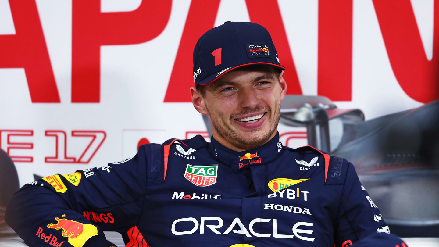 SUZUKA, JAPAN - SEPTEMBER 23: Pole position qualifier Max Verstappen of the Netherlands and Oracle