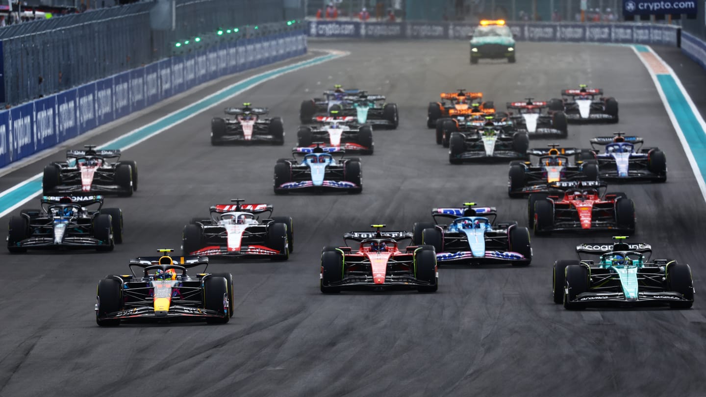 MIAMI, FLORIDA - MAY 07: Sergio Perez of Mexico driving the (11) Oracle Red Bull Racing RB19 leads