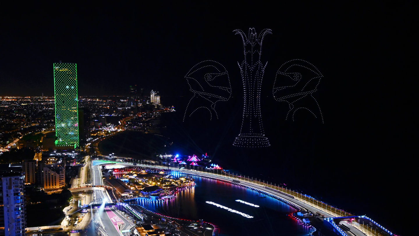 JEDDAH, SAUDI ARABIA - MARCH 19: A drone light display showing racing drivers is seen over the grid