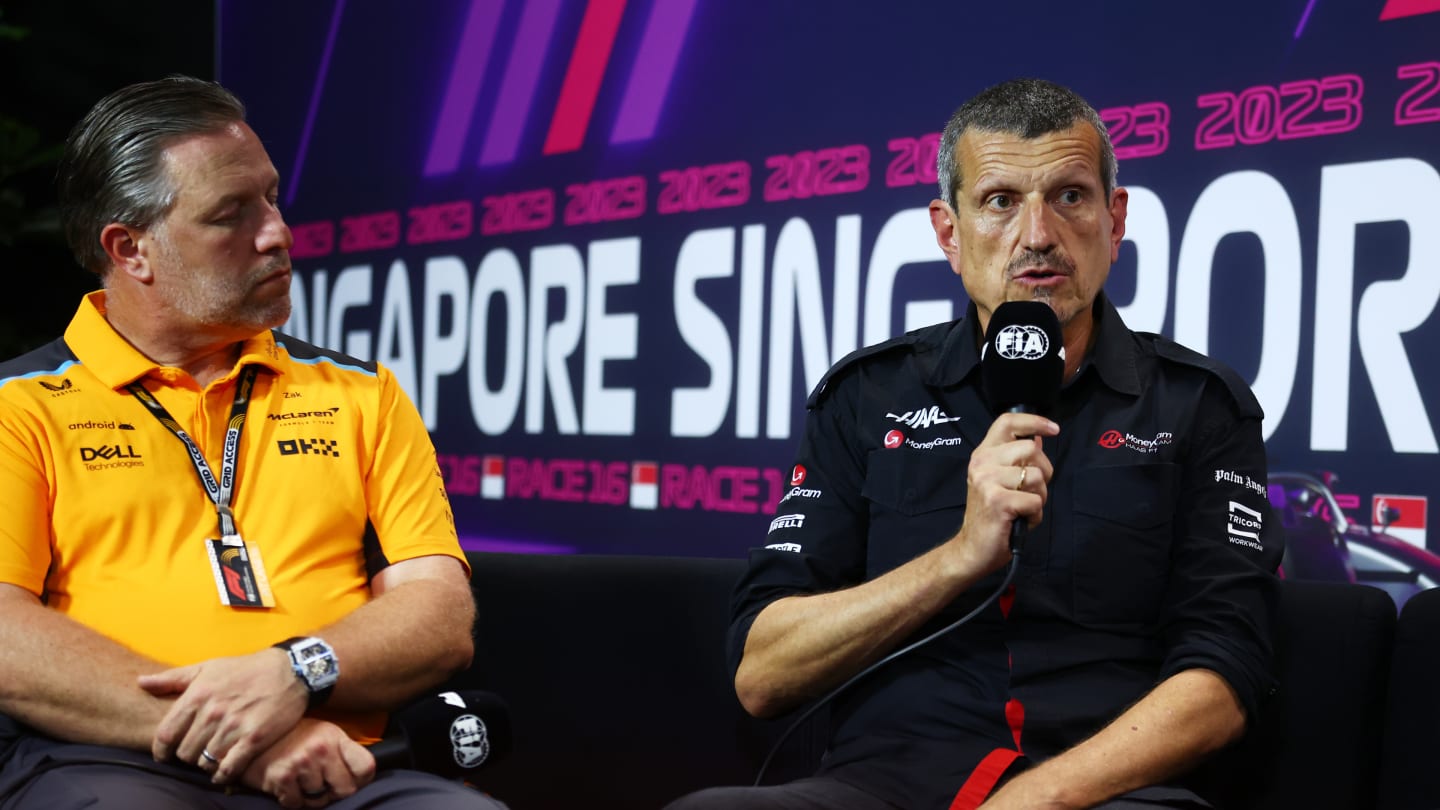 SINGAPORE, SINGAPORE - SEPTEMBER 15: Haas F1 Team Principal Guenther Steiner talks as McLaren Chief