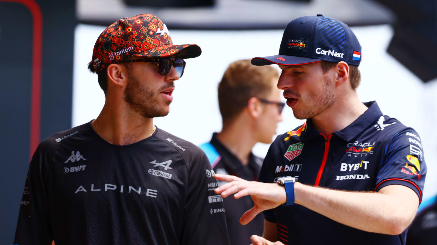 BARCELONA, SPAIN - JUNE 04: Pierre Gasly of France and Alpine F1 talks with Max Verstappen of the