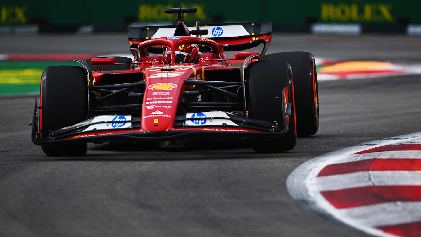 SINGAPORE, SINGAPORE - SEPTEMBER 21: Charles Leclerc of Monaco driving the (16) Ferrari SF-24 on