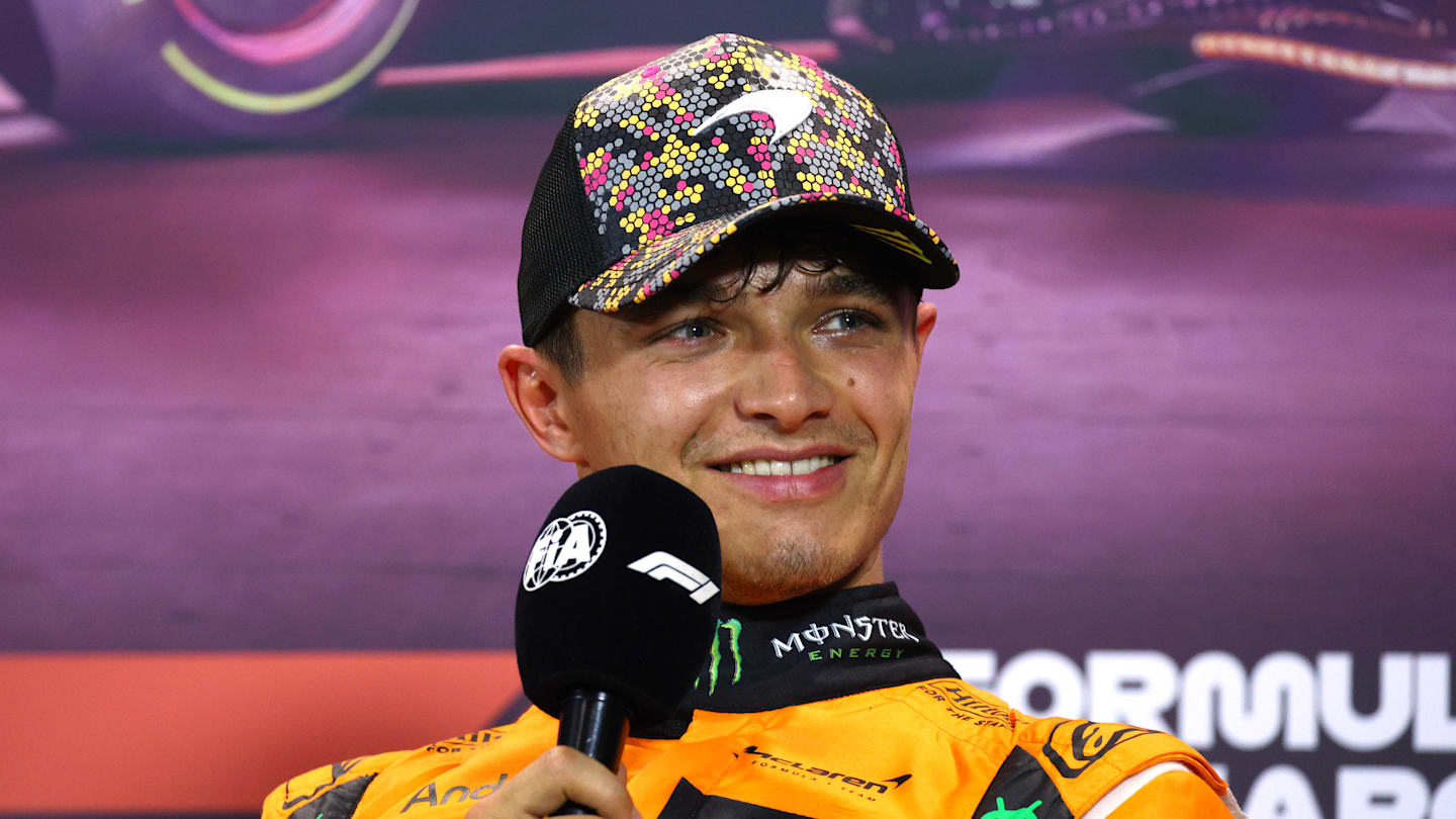 SINGAPORE, SINGAPORE - SEPTEMBER 21: Pole position qualifier Lando Norris of Great Britain and