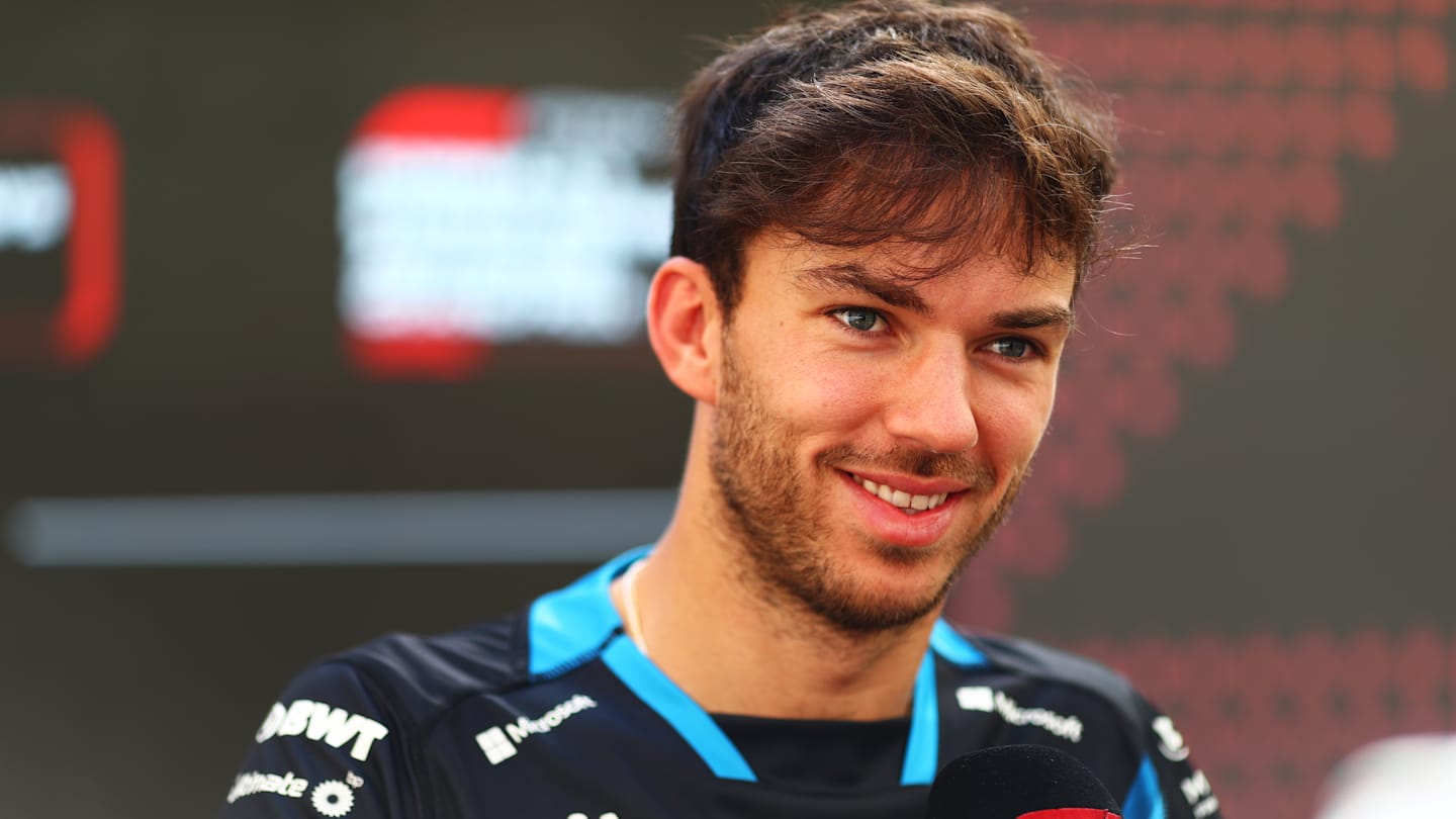 ABU DHABI, UNITED ARAB EMIRATES - DECEMBER 05: Pierre Gasly of France and Alpine F1 talks to the