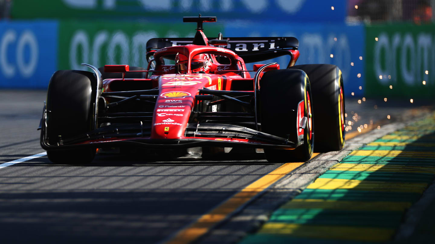 MELBOURNE, AUSTRALIA - MARCH 22: Sparks fly behind Charles Leclerc of Monaco driving the (16)