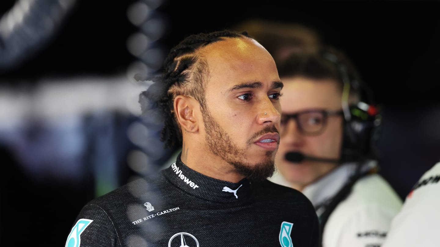 MELBOURNE, AUSTRALIA - MARCH 23: Lewis Hamilton of Great Britain and Mercedes looks on in the