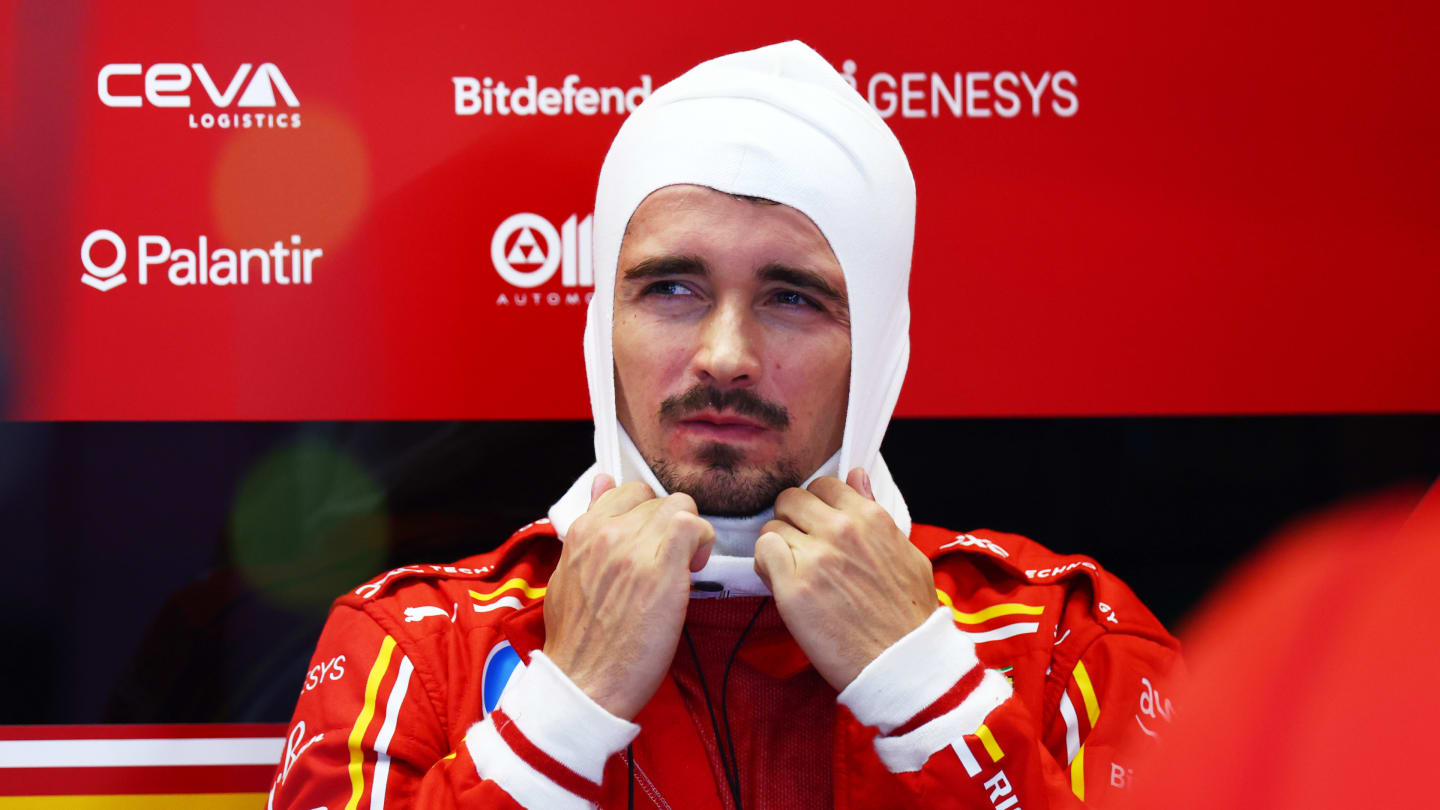 SPIELBERG, AUSTRIA - JUNE 28: Charles Leclerc of Monaco and Ferrari prepares to drive in the garage