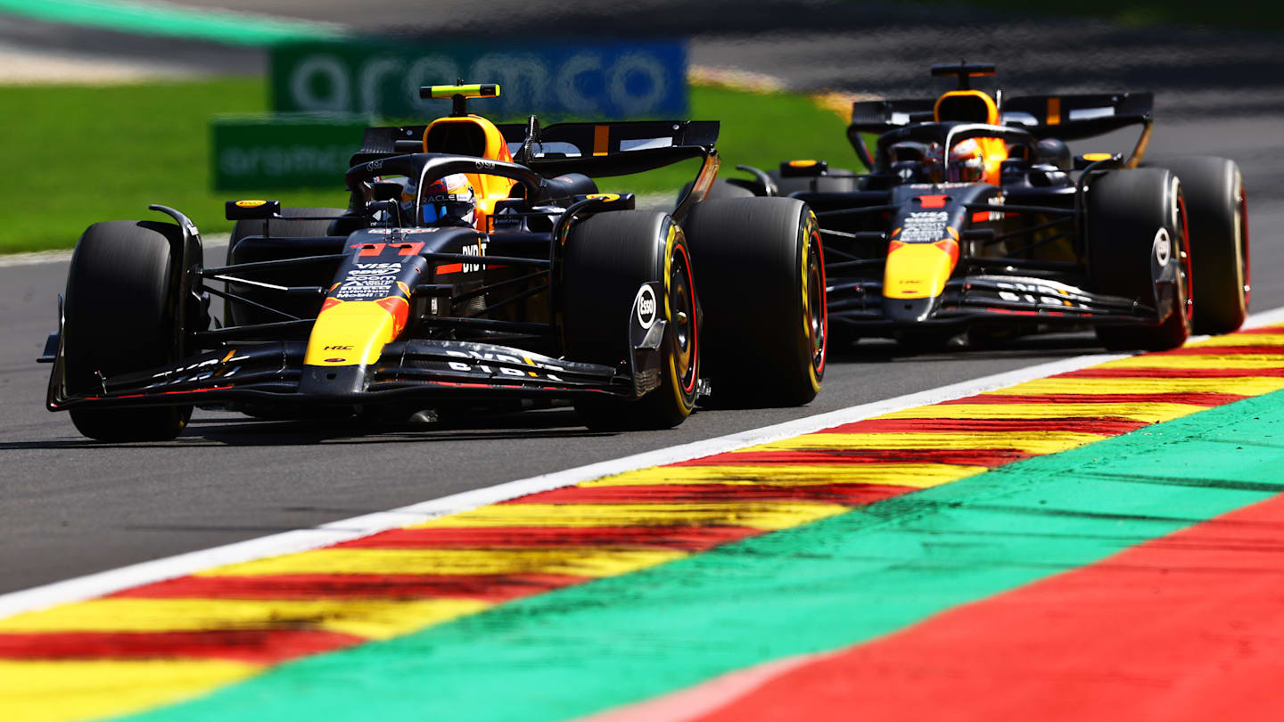 SPA, BELGIUM - JULY 28: Sergio Perez of Mexico driving the (11) Oracle Red Bull Racing RB20 leads