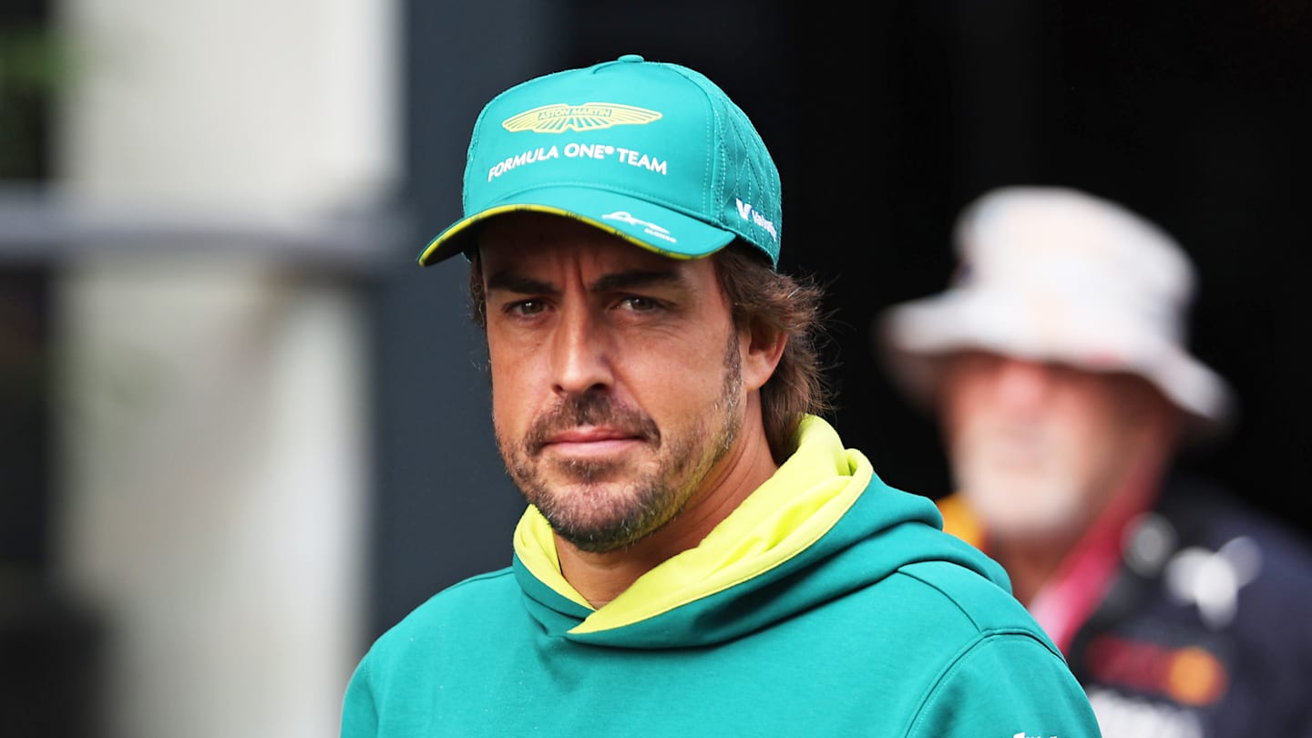 SPA, BELGIUM - JULY 26: Fernando Alonso of Spain and Aston Martin F1 Team arrives in the paddock