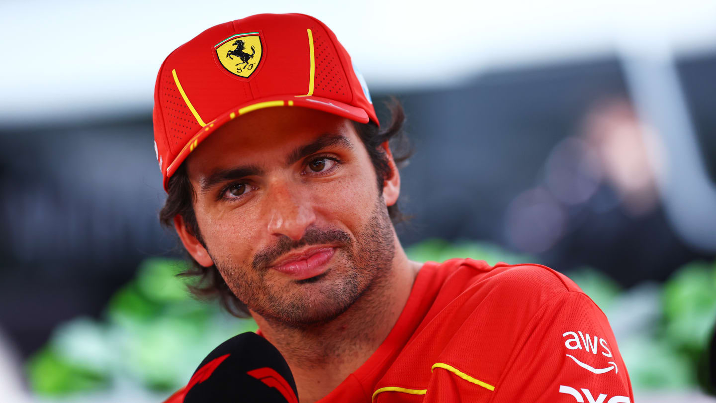 MONTREAL, QUEBEC - JUNE 06: Carlos Sainz of Spain and Ferrari talks to the media in the Paddock