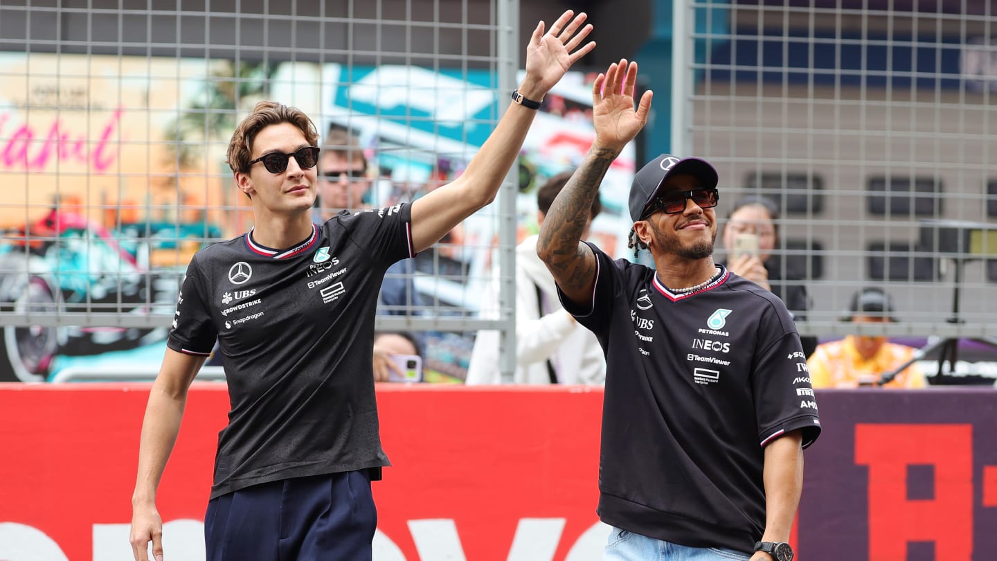 SHANGHAI, CHINA - APRIL 21: Lewis Hamilton of Great Britain and Mercedes and George Russell of