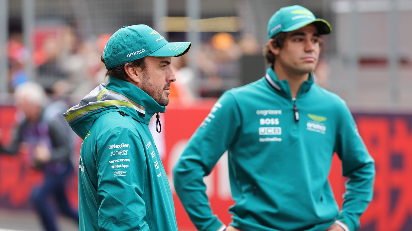 SHANGHAI, CHINA - APRIL 21: Fernando Alonso of Spain and Aston Martin F1 Team and Lance Stroll of