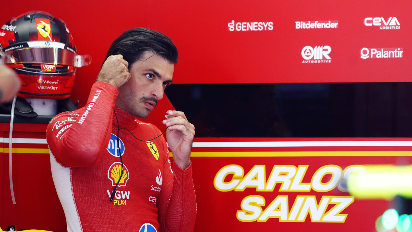 IMOLA, ITALY - MAY 17: Carlos Sainz of Spain and Ferrari prepares to drive in the garage during