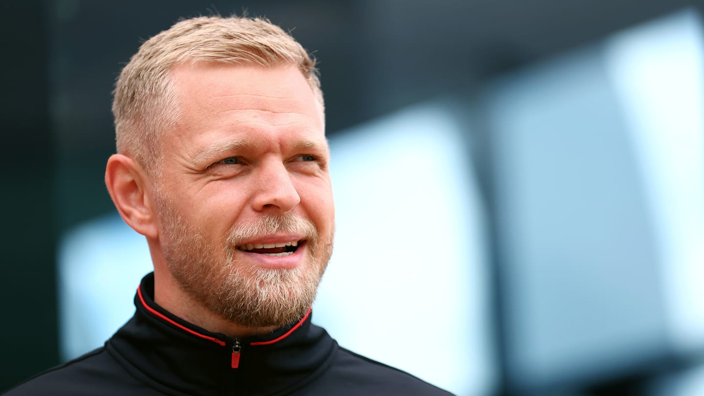 NORTHAMPTON, ENGLAND - JULY 04: Kevin Magnussen of Denmark and Haas F1 looks on in the Paddock