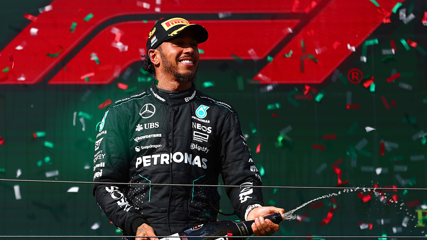 BUDAPEST, HUNGARY - JULY 21: Third placed Lewis Hamilton of Great Britain and Mercedes celebrates