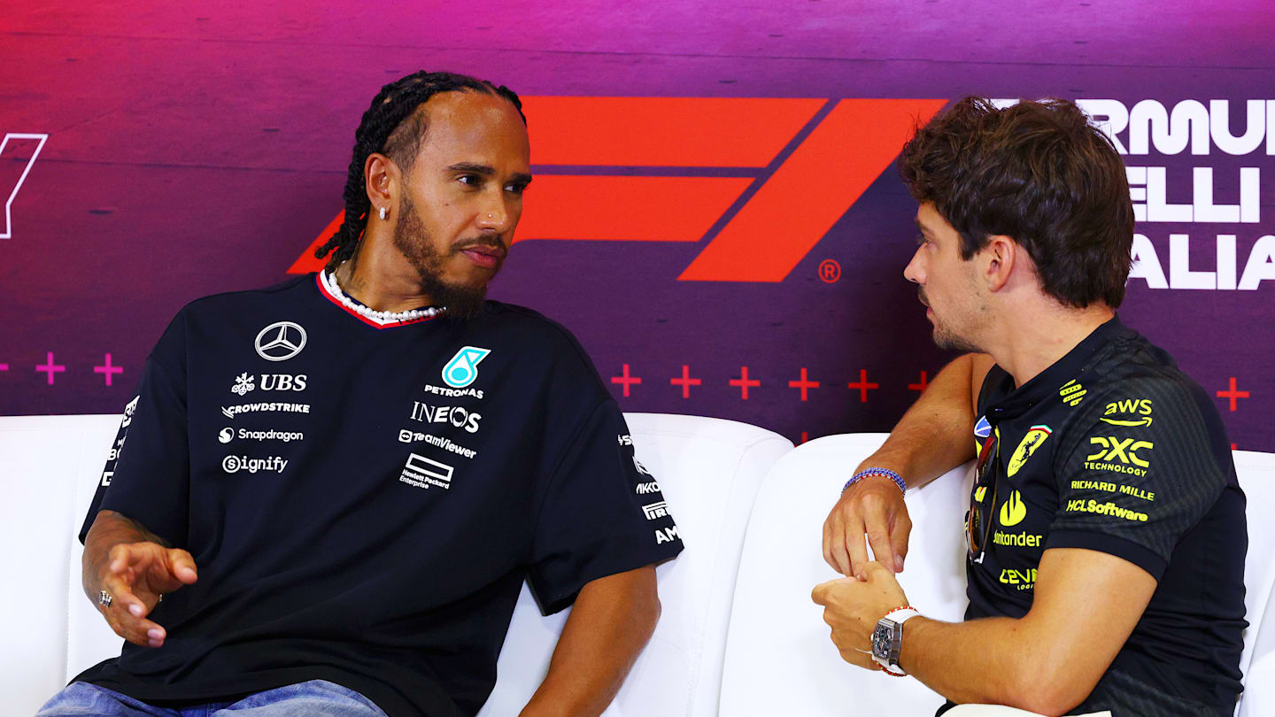 MONZA, ITALY - AUGUST 29: Lewis Hamilton of Great Britain and Mercedes and Charles Leclerc of