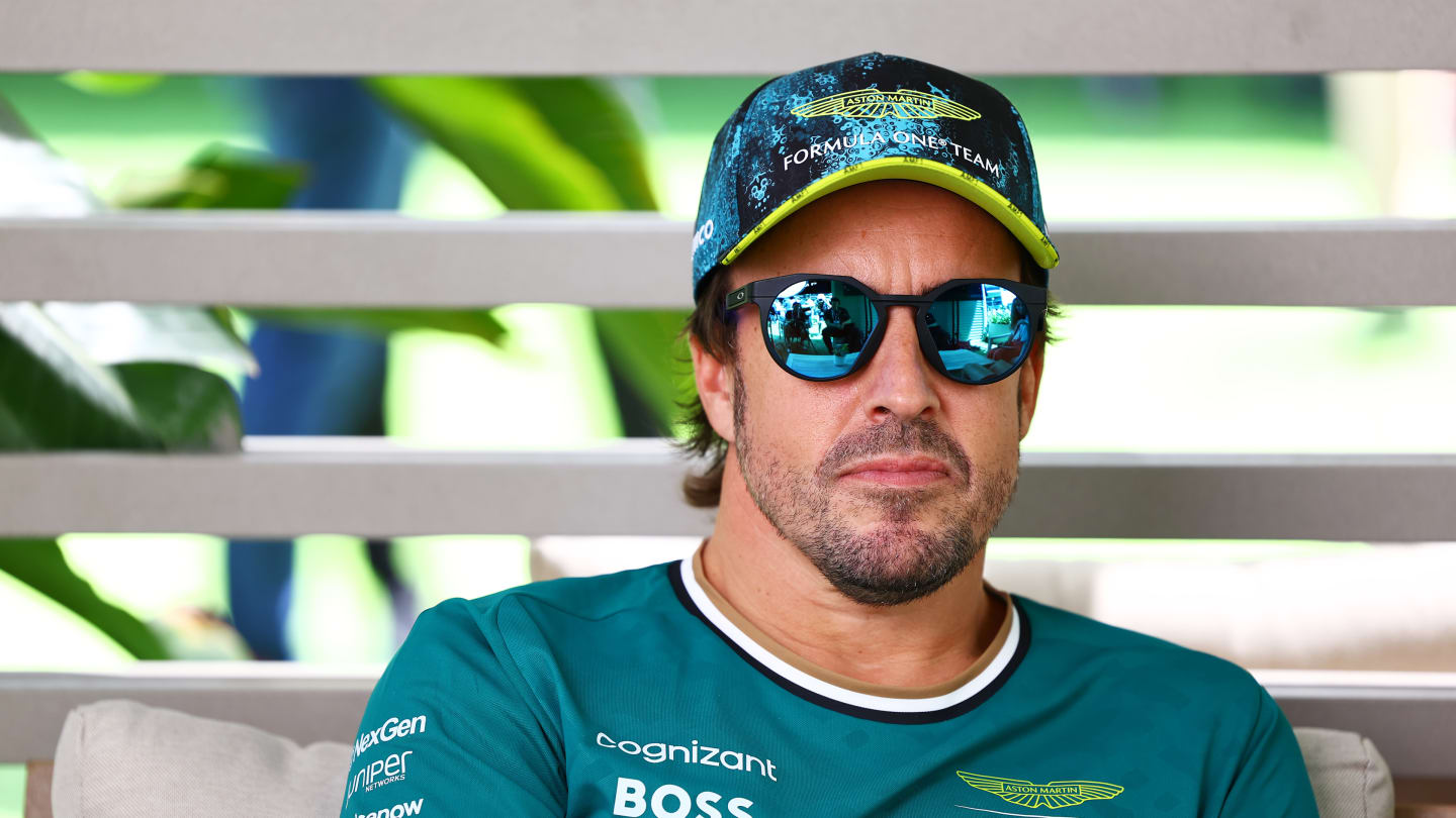 MIAMI, FLORIDA - MAY 02: Fernando Alonso of Spain and Aston Martin F1 Team looks on in the Paddock